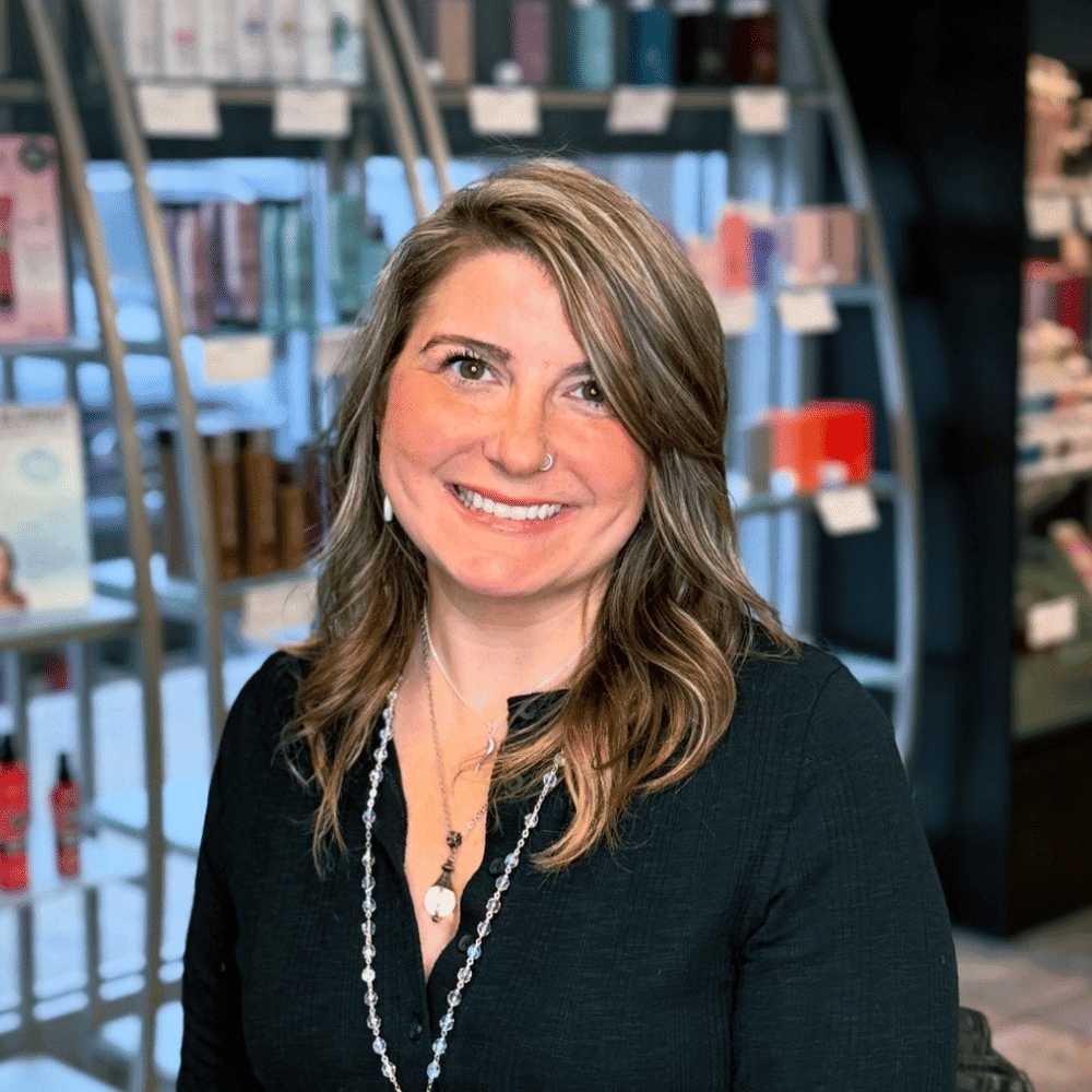 Portrait of Jen, a professional stylist at Platinum Hair Salon, showcasing their expertise and style.